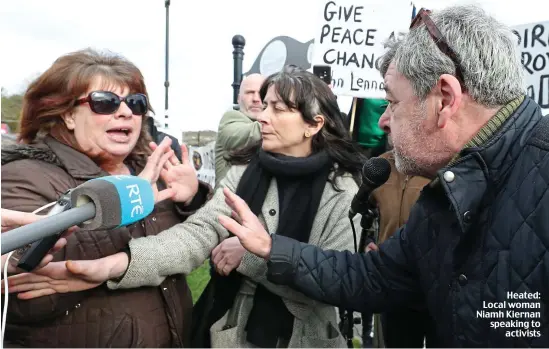  ??  ?? Heated: Local woman Niamh Kiernan speaking to activists