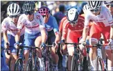  ?? ?? Britain's Pfeiffer Georgi (L) and Poland's Karolina Kumiega (R) compete in the women's elite cycling road in the UCI Road World Championsh­ips, on Saturday