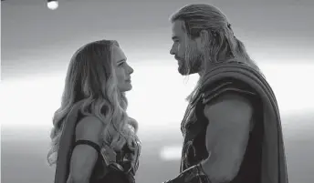  ?? Jasin Boland / TNS ?? Natalie Portman and Chris Hemsworth star in “Thor: Love and Thunder.”