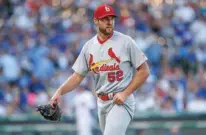  ?? Associated Press ?? n St. Louis Cardinals starting pitcher Michael Wacha leaves the baseball game against the Chicago Cubs during the sixth inning Saturday in Chicago.