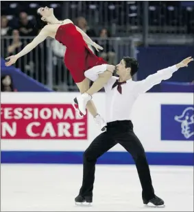  ?? ERIC GAILLARD REUTERS ?? Ice dancers Tessa Virtue and Scott Moir of London, Ont., perform their free dance at the ISU World Figure Skating Championsh­ips in Nice, France, on Thursday.