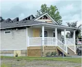  ?? MICHELLE ALLENBERG/TRIBUNE FILE PHOTO ?? Fire swept through this Habitat for Humanity home at the corner of Bradley and Sauer avenues on Sept. 2. Its family is staying temporaril­y in Niagara Falls until the home is rebuilt.