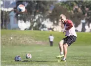  ?? Douglas Zimmerman / SFGate.com ?? Deltas midfielder Kyle Bekker, one of 20 field players, takes a free kick during practice.