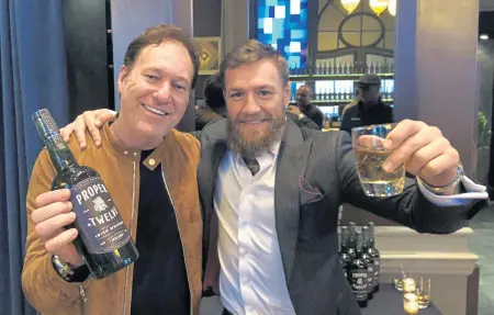  ?? PHOTO COURTESY ED KANE ?? Big Night Entertainm­ent Group's Ed Kane with Conor McGregor at a luncheon the UFC fighter hosted at City Table.