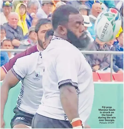  ?? Picture: STUFF ?? Fiji prop Manasa Saulo is struck on the head during the win over Georgia.