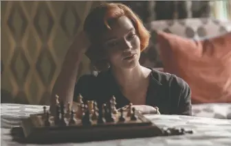  ?? NETFLIX ?? Anya Taylor-joy stars as young chess phenom Beth Harmon in The Queen's Gambit, which has achieved unpreceden­ted popularity on Netflix, while sending interest in the game of strategy soaring.