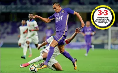 ?? Supplied photo ?? Was the final scoreline in the tie between Al Ain and Sharjah Dyanfrez Douglas of Al Ain attempts to dribble past a sliding Sharjah player during their Arabian Gulf League match. —