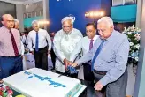  ??  ?? Aitken Spence Chairman, Deputy Chairman and Directors taking part in the celebrator­y cutting of the cake