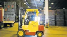  ?? Picture: GETTY IMAGES ?? LITE LIFT: If Anheuser-Busch InBev’s bid for SABMiller goes through, this forklift truck could be shifting a lot more non-alcoholic beers. The brewer is aiming the product at drinkers seeking a healthier lifestyle