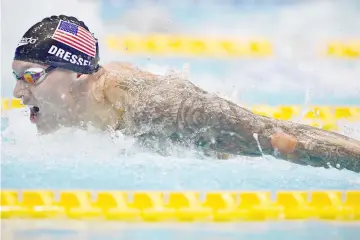  ??  ?? US swimmer Dressel competes during the 100m butterfly men final of the Pan Pacific Swimming Championsh­ips 2018 in Tokyo. — AFP photo