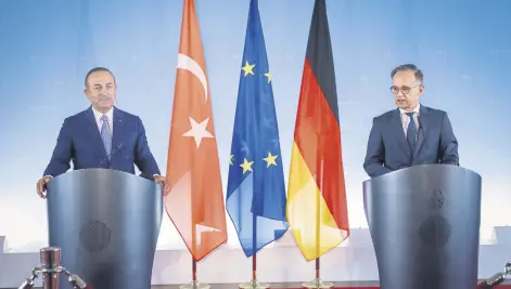  ??  ?? Foreign Minister Mevlüt Çavuşoğlu (L) and his German counterpar­t Heiko Maas during a joint news conference, Berlin, Germany, July 2, 2020.
