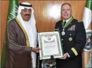  ?? PHOTO PROVIDED ?? Army Brig. Gen. Paul Laughlin at the ceremony in which he received the King Abdulaziz Medal from Prince Miteb bin Abdullah of Saudi Arabia.