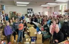 ?? PHOTO BY HATBORO-HORSHAM SCHOOL DISTRICT ?? Fifth grade students pack up the donations of food and toiletries.