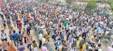  ?? Photo: AFP ?? Bangladesh­i students block a road during a student protest in Dhaka on August 4, 2018, following the deaths of two college students in a road accident.