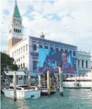  ?? Mick LaSalle / The Chronicle 2013 ?? The French would never go for a giant ad like this one at Venice’s Palazzo Ducale.