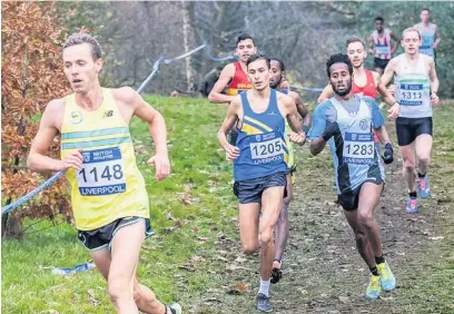  ??  ?? ●●Ross Millington winning the British Athletics Cross Challenge