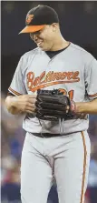  ??  ?? PILING UP THE O’S: Ubaldo Jimenez smiles on the mound during Baltimore’s 4-0 victory last night.