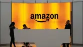  ??  ?? In this Feb. 14, 2019, file photo, People stand in the lobby for Amazon offices in New York. Some Democratic members of Congress and national union leaders have gathered, seeking to build support for unionizing a massive Amazon facility