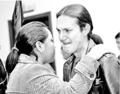  ??  ?? Relatives and friends of Ortega, Rivas and Segarra, react during an authoritie­s’ press conference in Quito. — AFP photo