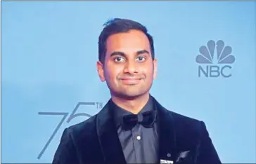  ?? FREDERIC J BROWN/AFP ?? Aziz Ansari poses with the trophy for Best Performanc­e by an Actor in a Television Series - Musical or Comedy during the 75th Golden Globe Awards in Beverly Hills, California, on January 7.