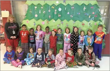  ??  ?? Wanda Brewster’s first-grade class (ABOVE), Krushinda Brannon’s first-grade class (BELOW, LEFT), and Honesty Knight’s Pre-K class (BELOW, RIGHT) celebrate Polar Express Day.
Photos contribute­d by Susan Crawford