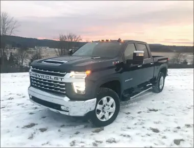  ?? MARC GRASSO — BOSTON HERALD ?? The Chevrolet Silverado 2500HD is a lot of truck for the money, scoring high marks for practicali­ty and on-the-job functional­ity.