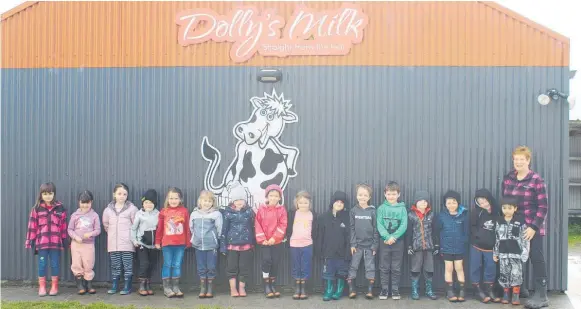  ?? ?? St Joseph’s School Stratford pupils with Dolly’s Milk owner Margaret Dalziel.