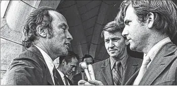  ?? CP PHOTO ?? Reporters Tim Ralfe, right, and Peter Reilly, centre, question Prime Minister Pierre Trudeau on the steps of Parliament Hill on Oct. 13, 1970, about the FLQ crisis and the invocation of the War Measures Act.