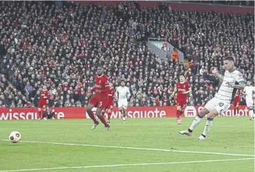  ?? ?? Atalanta’s Gianluca Scamacca scores his team’s second goal against Liverpool at Anfield last night