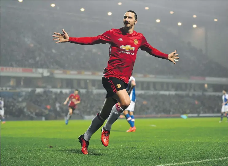  ?? — GETTY IMAGES ?? Manchester United’s Zlatan Ibrahimovi­c celebrates after scoring the winning goal against the Blackburn Rovers in the 75th minute on Sunday at Ewood Park.