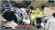  ?? PHOTO: ODT FILES ?? Head on . . . A woman was airlifted to hospital after being freed from the wreckage of this crash in Beaumont last year.