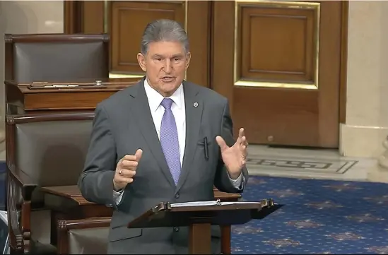  ?? AP ?? FINAL CHANCE: Sen. Joe Manchin, Joe, D-W.Va., and Rep. Adam Schiff, right, speak on the Senate floor about the impeachmen­t trial against President Trump on Monday.