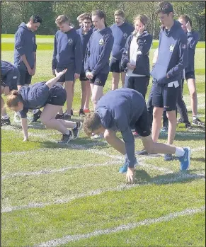  ??  ?? England schools team manager Ian Roberts spent a day with young athletes at Market Bosworth’s Dixie Grammar School