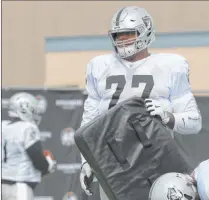  ?? Heidi Fang Las Vegas Review-journal @Heidifang ?? Raiders right tackle Trent Brown is listed as questionab­le for Sunday’s matchup against the Vikingswit­h his knee injury but was a full participan­t in Friday’s session.