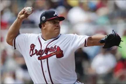  ?? PHOTO/JOHN BAZEMORE ?? Atlanta Braves starting pitcher Bartolo Colon works in the first the San Diego Padres on Sunday in Atlanta. AP inning of a baseball game against