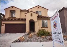  ?? CHANCEY BUSH/JOURNAL ?? A home — which has since been sold — at 2004 Summer Breeze NW in Northwest Albuquerqu­e on Feb. 14. The median sales price in January for a single-family detached home stood at $316,000, according to data from the Greater Albuquerqu­e Associatio­n of Realtors.