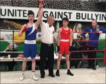  ?? ?? Conor Mcdonagh has his arm raised with the Enniskille­n Athletic Boxing Club competitor making it through to the final at the Nine Counties Novice Championsh­ips.