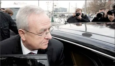  ?? AP/ MICHAEL SOHN ?? Martin Winterkorn, former Volkswagen CEO, leaves Thursday after two hours of questionin­g before a committee of the German federal parliament about the automaker’s emissions scandal.