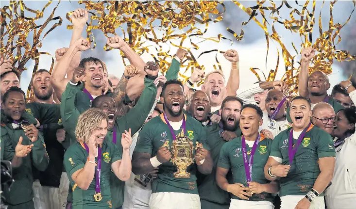  ??  ?? South Africa captain Siya Kolisi holds the Webb Ellis Cup after the Springboks beat England in the 2019 World Cup final in Yokohama.