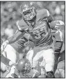  ?? NWA Democrat-Gazette/J.T. WAMPLER ?? Arkansas running back David Williams rushed for 47 yards on 15 carries Saturday. The Razorbacks totaled 230 rushing yards while holding New Mexico State to 11.