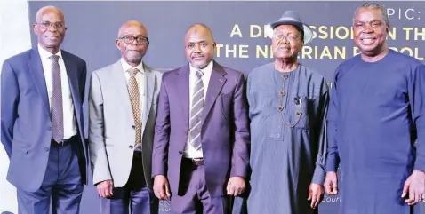  ??  ?? Chairman, The Petroleum Club, Dr. Layi Fatona( left); Honoree, Dr. Godswill Ihetu; Director- General, Department of Petroleum Resources, Sarki Auwalu; Honoree, Chief Chambers Oyibo; and Executive Chairman and Founder, AA Holdings, Austin Avuru at The Petroleum Club's 2021 yearly business dinner in Lagos.