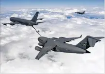  ??  ?? The Air Force Life Cycle Management Center at Wright-Patterson oversees the multibilli­on-dollar Boeing KC-46 refueling tanker program, pictured here offloading fuel to a C-17 in July 2016.