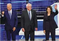  ?? Saul Loeb / AFP/Getty Images ?? Biden and Sanders have been dubbed the heavyweigh­ts of the Democratic party’s progressiv­e and moderate wings, but Harris had been called a rising star before the debate.