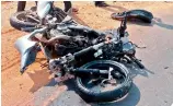  ??  ?? The impact from hurtling into the car left the motorbike involved in the accident a mangled