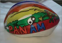  ?? , SUBMITTED PHOTOS ?? Milton’s Anne J. MacArthur Public School (Mrs. Day’s Grade 2 class) was one of eight schools to work with a local artist to design a bicycle helmet with the Pan Am games in mind.