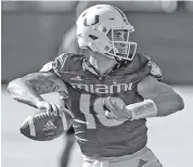  ?? AL DIAZ adiaz@miamiheral­d.com ?? UM quarterbac­k Tate Martell, a 2019 transfer from Ohio State, has opted out of the season due to COVID-19 issues.