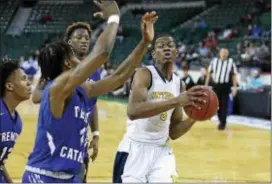  ?? JOHN BLAINE — FILE PHOTO — FOR THE TRENTONIAN ?? Nottingham’s Darell Johnson (5) put in 29 points to help his team beat Ocean Twp. on Wednesday night.