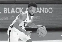  ?? JOHN RAOUX/AP ?? UCF’s Darin Green Jr. led the Knights with 18 points during a win over Tulane Friday night.