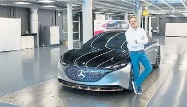  ??  ?? Markus Schäfer, member of the board of management of Daimler AG responsibl­e for group research and Mercedes-Benz cars developmen­t, with the Vision EQS concept. Top: Customer demand will decide how much longer the famous Mercedes-AMG V8 lives.