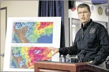  ?? DEBORAH CANNON / AMERICAN-STATESMAN ?? Nim Kidd, the Texas Department of Public Safety emergency management chief, speaks Thursday at the Emergency Operations Center in Austin. He urged people to be mindful of warnings and to not drive around high-water barricades.